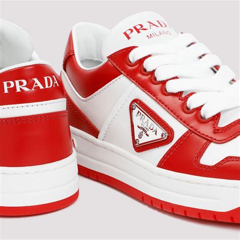 red prada sneakers|red round pradas.